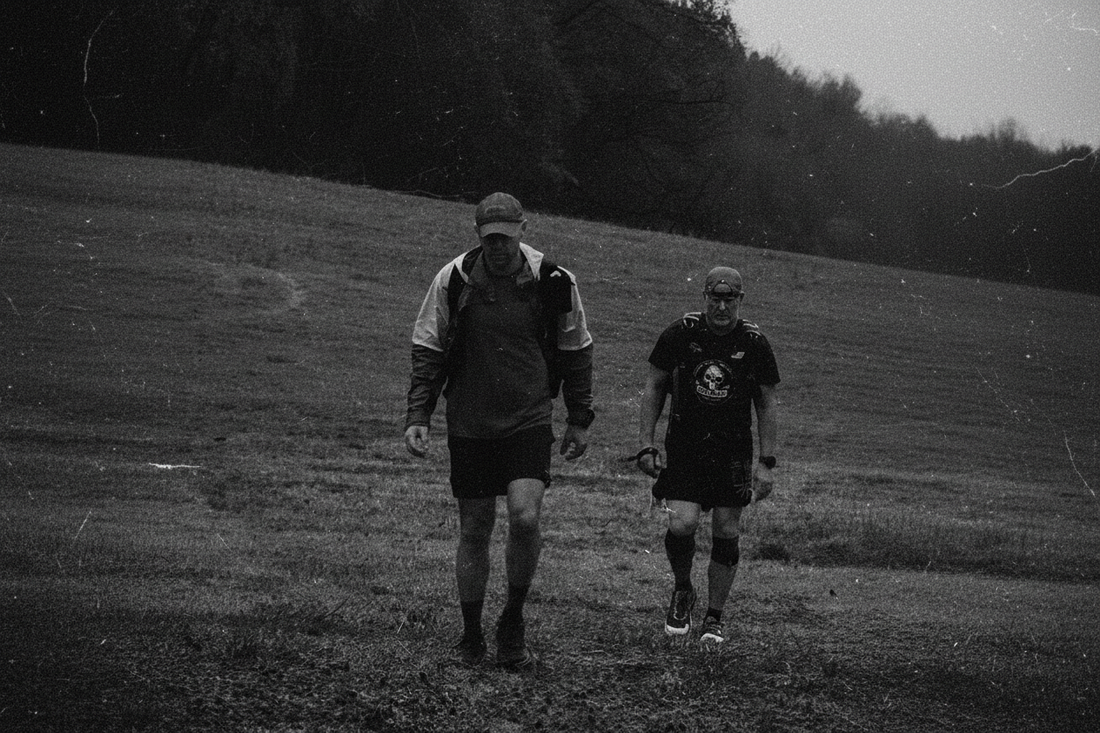 Two athletes rucking at the Hardwin Atheon Ruck, a partner race of Friction Prescription